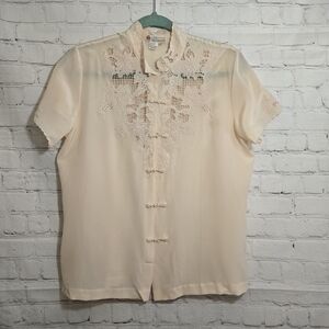 Elegant Cream Blouse with Lace Detailing
